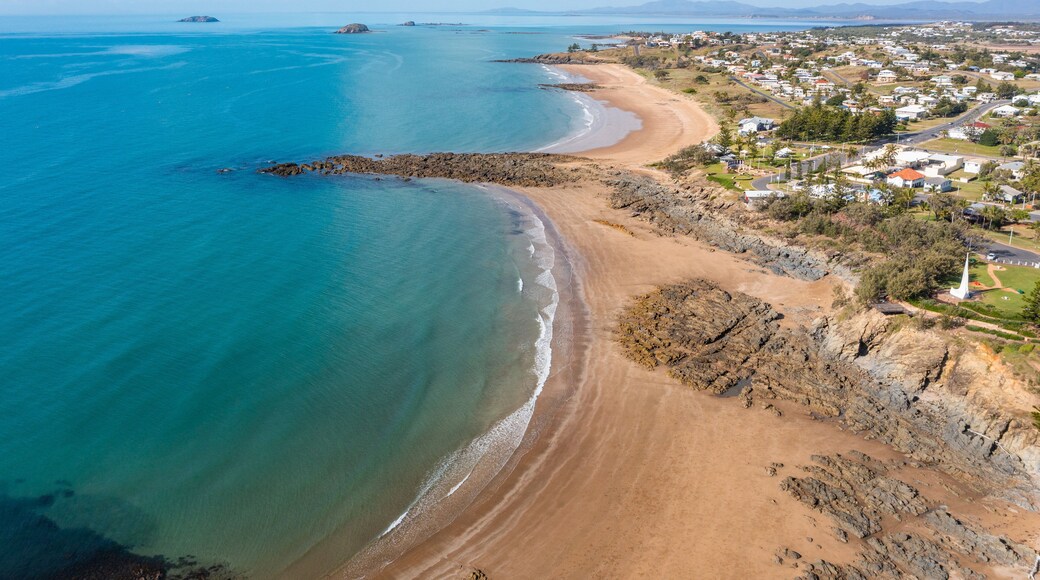Emu Park Main Beach featuring a coastal town, landscape views and general coastal views