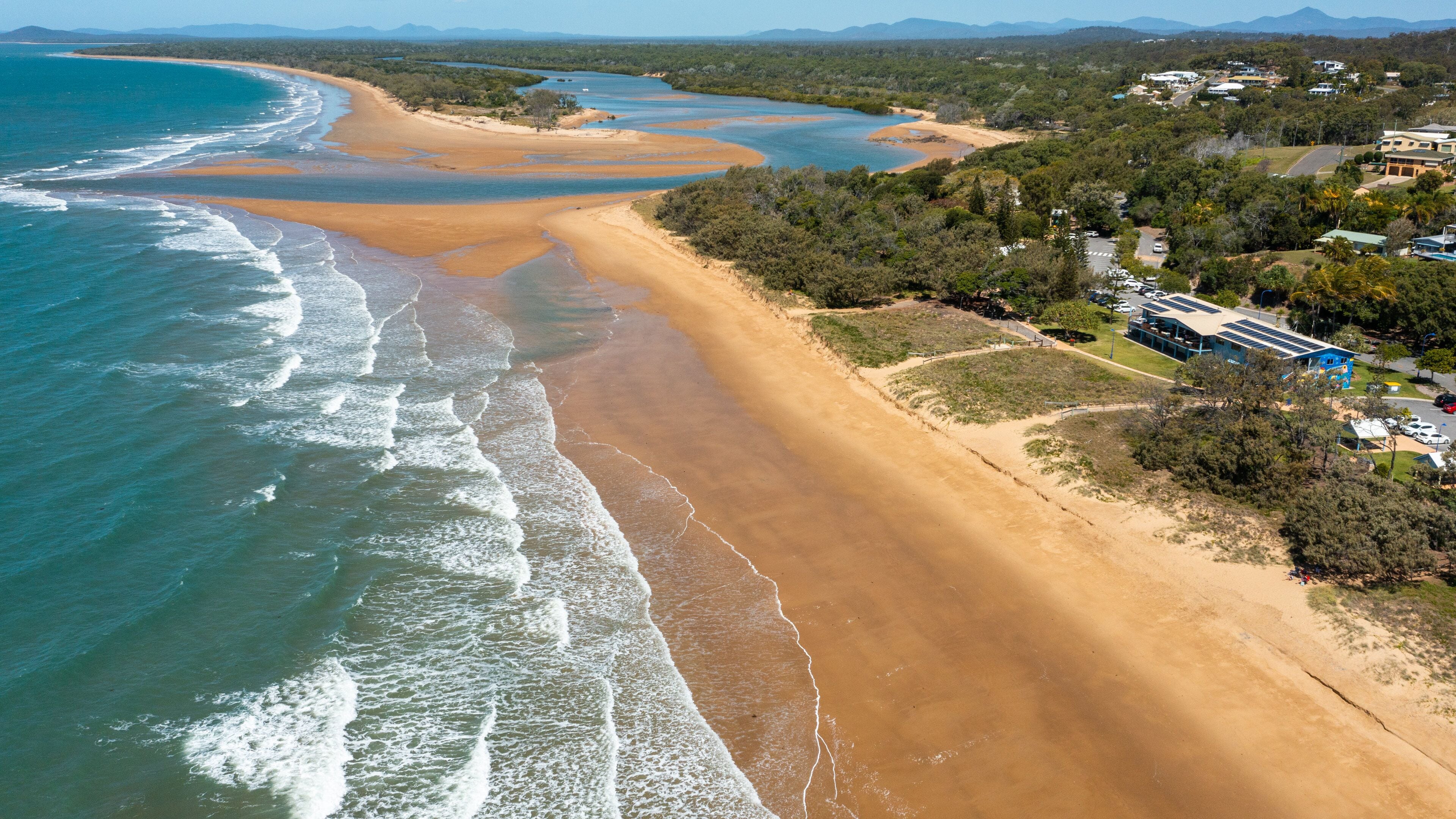 Capricorn Coast which includes general coastal views, landscape views and a sandy beach