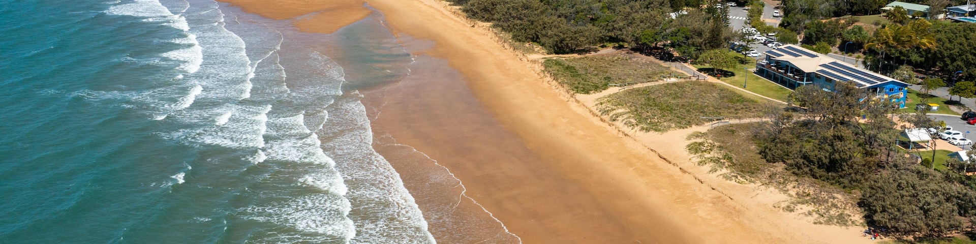 Capricorn Coast which includes general coastal views, landscape views and a sandy beach
