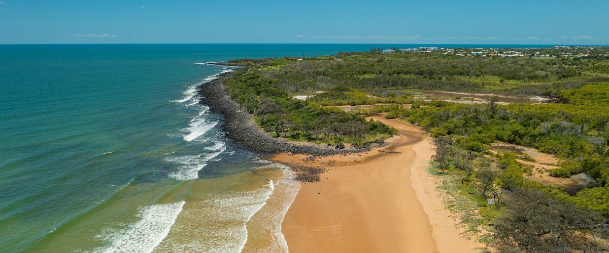 Mon Repos Beach showing a beach, general coastal views and landscape views