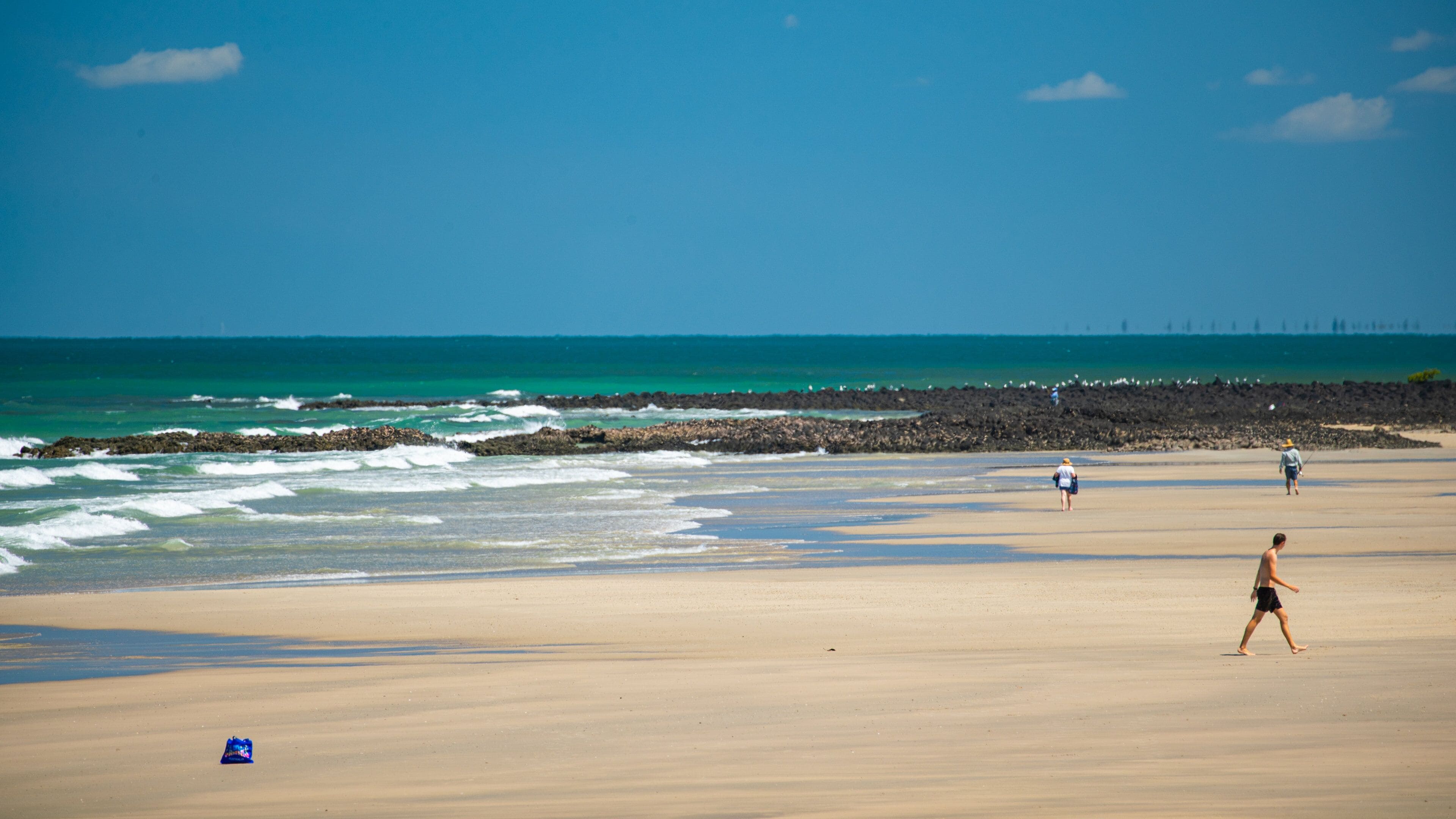 Elliot Heads Beach which includes general coastal views and a sandy beach