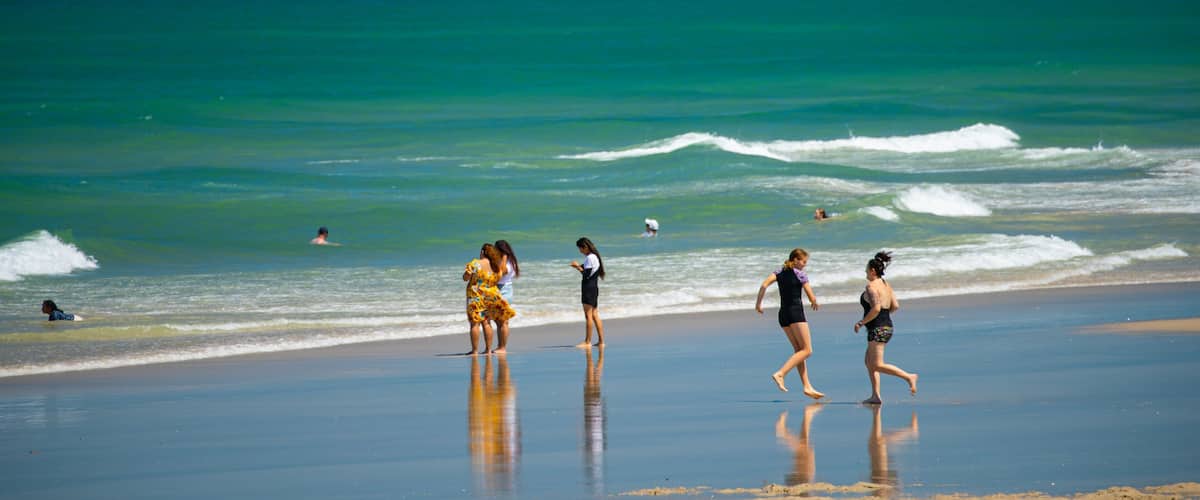 Elliot Heads Beach which includes general coastal views, swimming and a beach