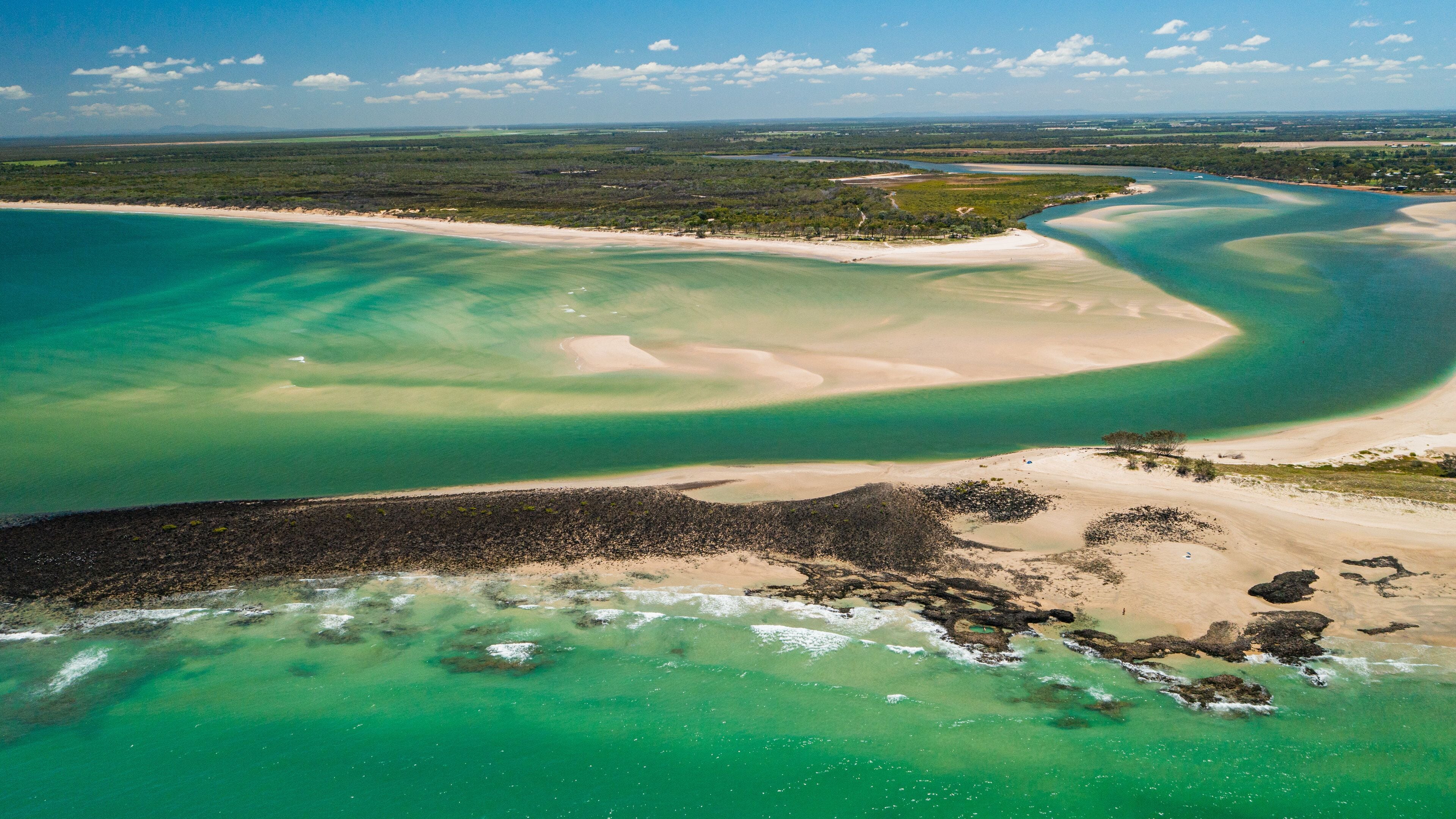 Elliot Heads Beach showing a sandy beach, landscape views and general coastal views