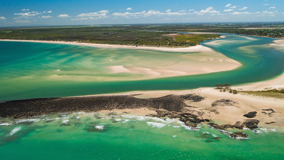 Elliot Heads Beach showing a sandy beach, landscape views and general coastal views