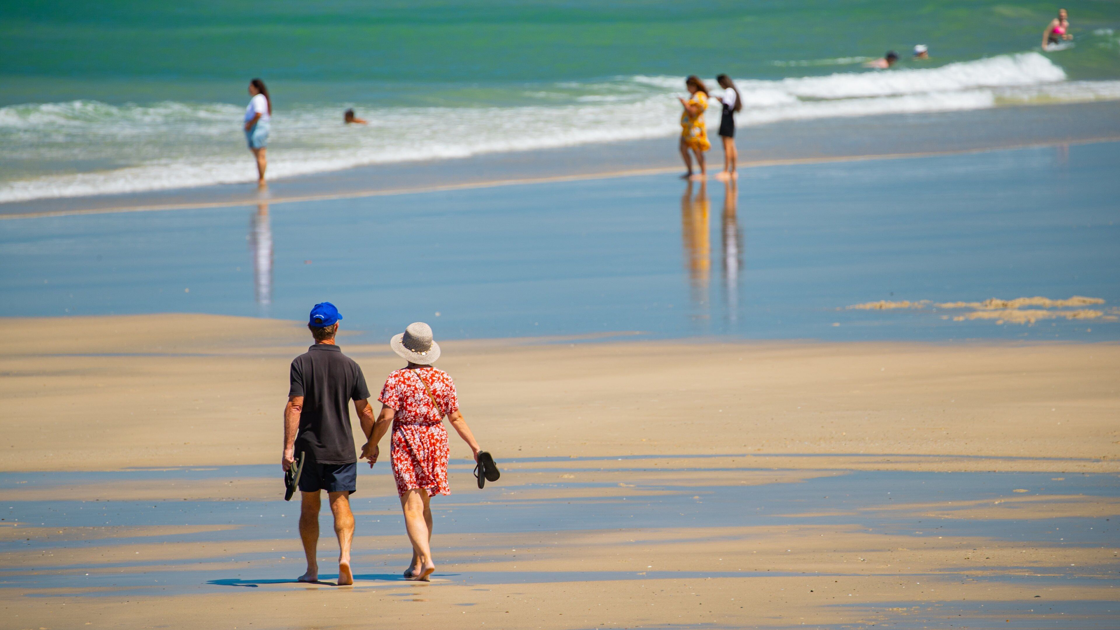 Elliot Heads Beach featuring a beach and general coastal views as well as a couple