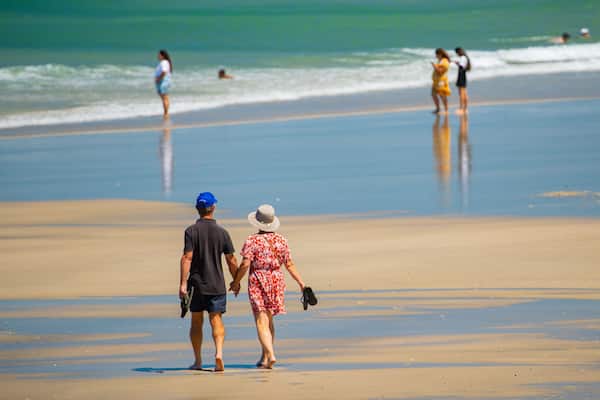 Elliot Heads Beach featuring a beach and general coastal views as well as a couple