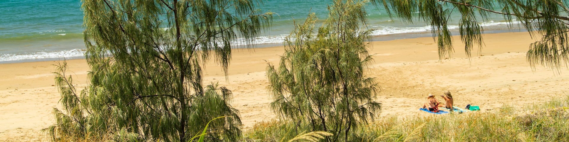 Kemp Beach which includes a beach and general coastal views as well as a couple