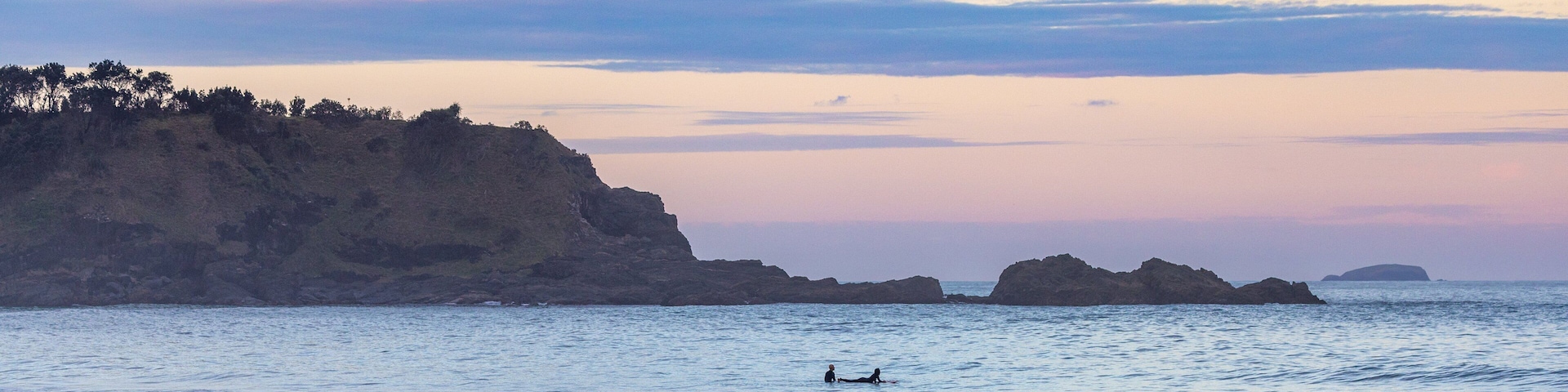 Little Diggers Beach featuring surfing, general coastal views and a sunset