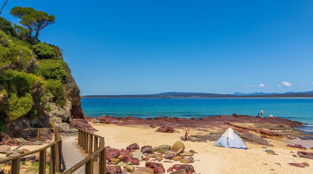 Bar Beach which includes a beach, rocky coastline and general coastal views