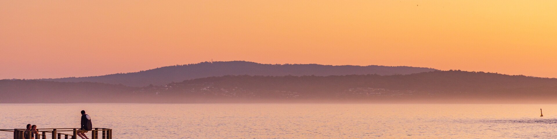 Bar Beach which includes a sandy beach, general coastal views and a sunset