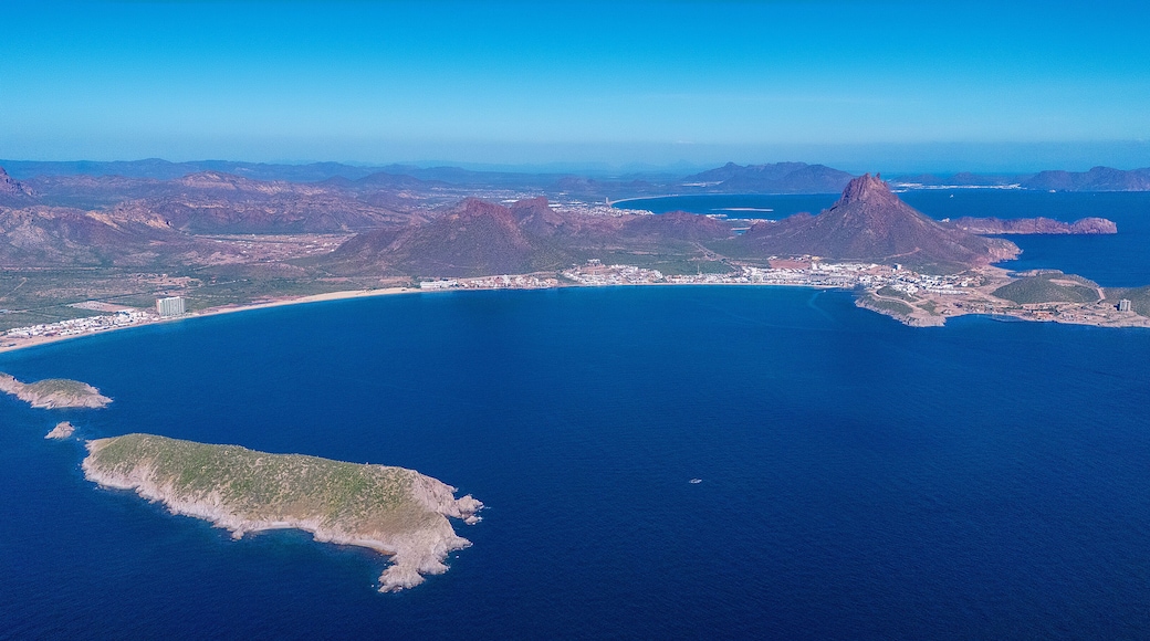 Aerial photo of Los Algodones beach in San Carlos Sonora, Mexico. The islands full of sahuaros stand out. An iconic contrast between desert and sea. In the background the rocky mountain Tetakawi.