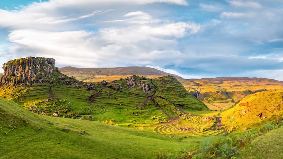 Panorama of famous mystic Fairy Glen at sunset, a green valley with romantic landscapes. Copy space in sky.