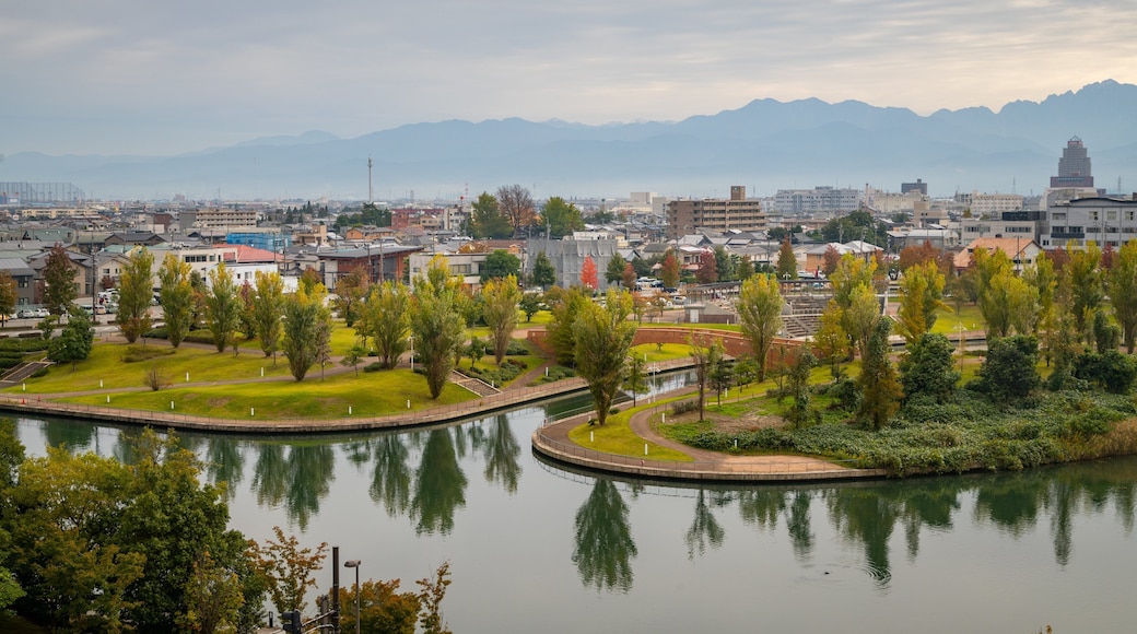 Toyama which includes a city, landscape views and a river or creek