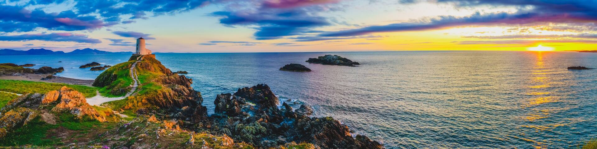 Sunset panorama of Lighthouse on Llanddwyn Island on the coast of Anglesey in North Wales,UK
