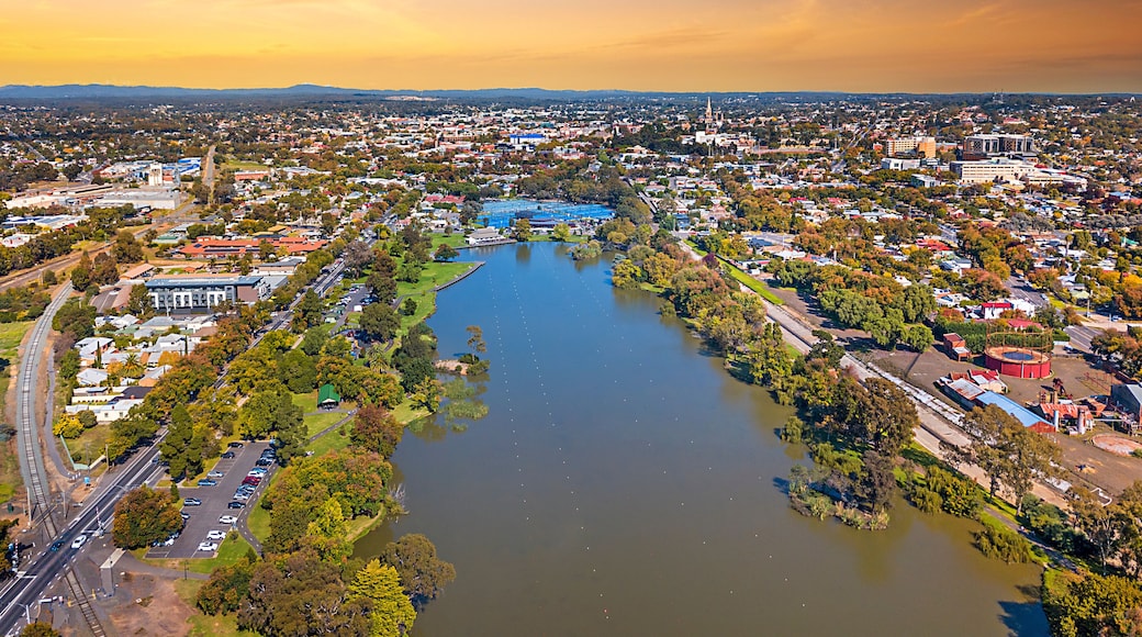 Lake Weeroona Bendigo panoramic view. Sunrise sunset morning evening flight with spectacular landscape and cityscape views. Red purple and blue skies. Central Victoria Australia.