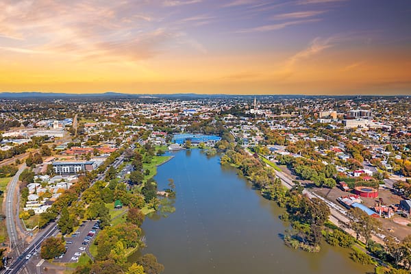 Lake Weeroona Bendigo panoramic view. Sunrise sunset morning evening flight with spectacular landscape and cityscape views. Red purple and blue skies. Central Victoria Australia.