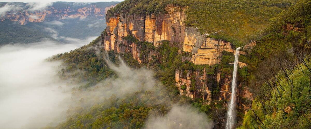 Govetts Leap lookout featuring a cascade, landscape views and mist or fog