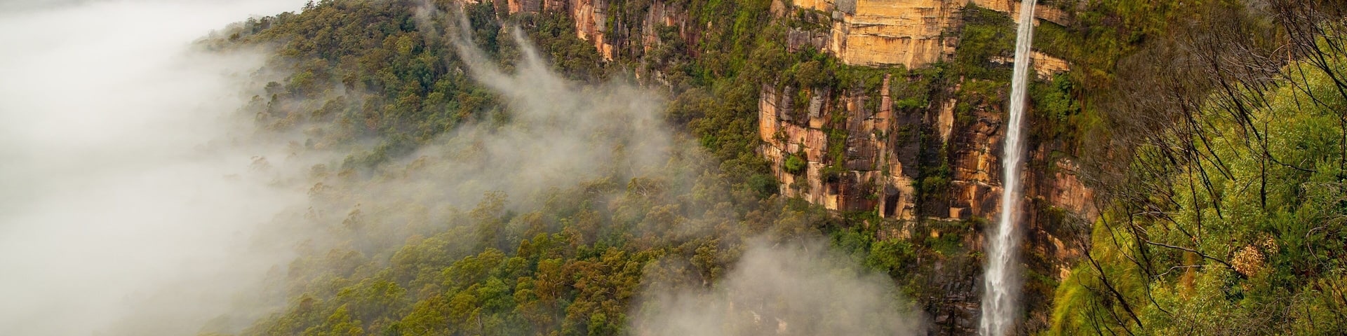 Govetts Leap lookout featuring a cascade, landscape views and mist or fog