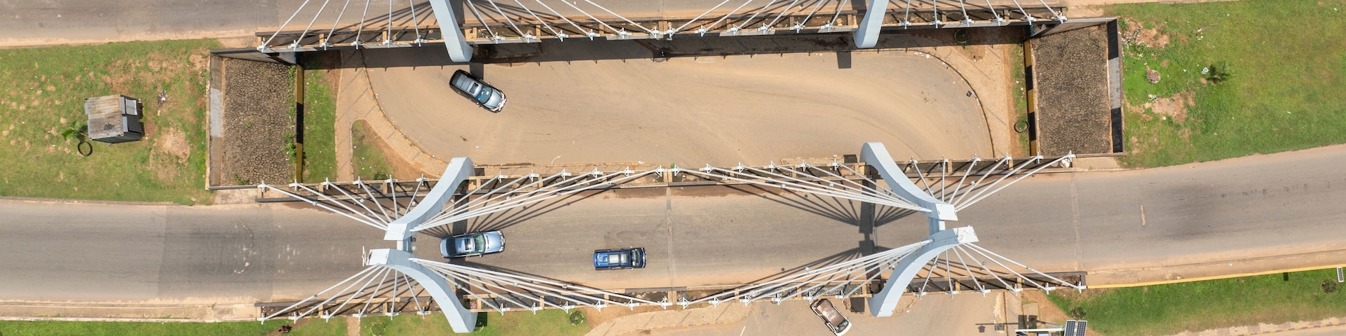 Aerial view of amawbia bridge with urban infrastructure and traffic, awka south, nigeria.