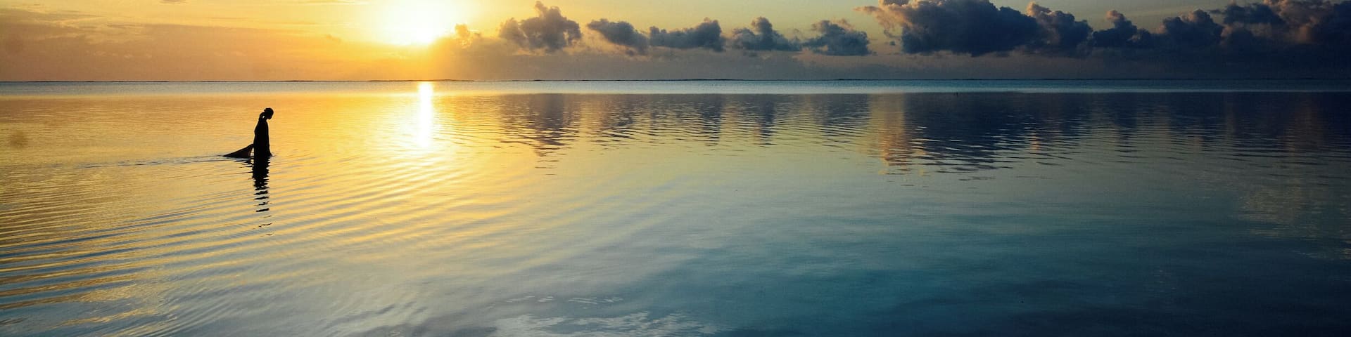 A local fisherman collecting seaweed from the shores of Zanzibar at the crack of dawn. #springfun