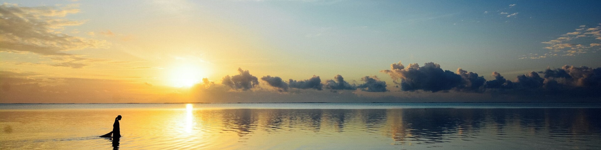 A local fisherman collecting seaweed from the shores of Zanzibar at the crack of dawn. #springfun