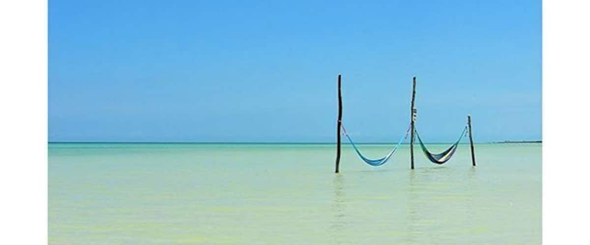 These picturesque hammocks can be found in the clear blue waters of Isla Holbox, Quintana Roo. Definitely one of our favourite spots in Mexico so far. #blue #islandlife