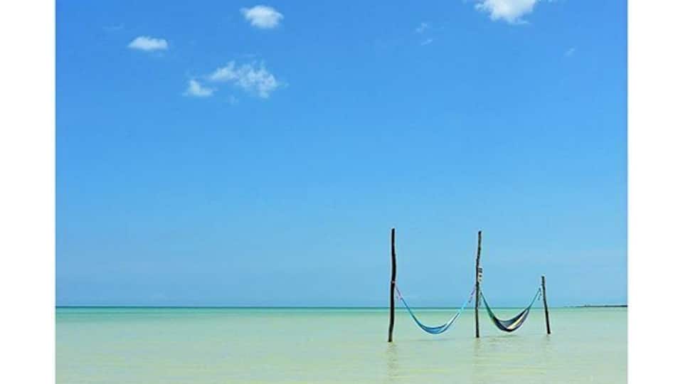 These picturesque hammocks can be found in the clear blue waters of Isla Holbox, Quintana Roo. Definitely one of our favourite spots in Mexico so far. #blue #islandlife