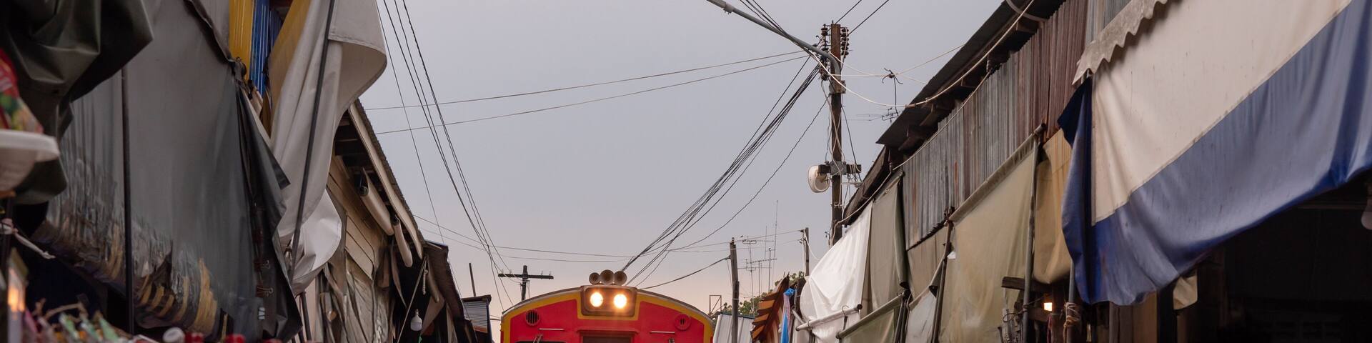 The most beautiful viewpoints Maeklong Railway Market (Talad Rom Hoop) In Samut Songkhram, Thailand.