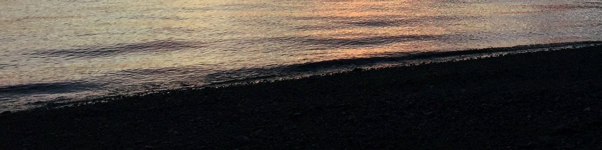 Sunset SUPing on still artic waters at Anisom Point. Nothing like a bear sighting several moments before to keep your on your toes (or board!) as you return to land. Alaska will forever amaze me. #Golden