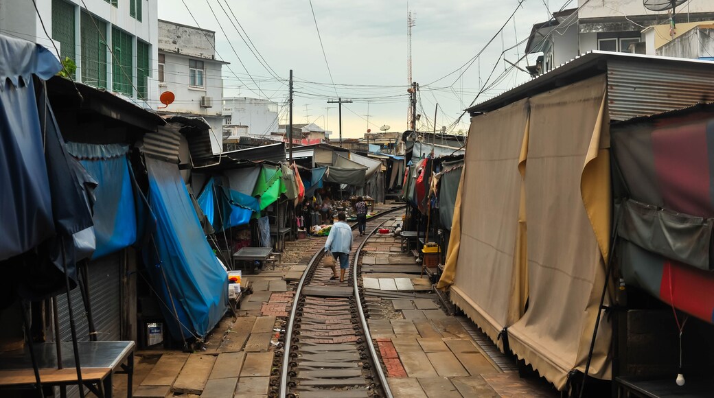 Landscape view of Rom Hoop Market (The folding umbrella market ) at Samut Sakhon city, Thailand