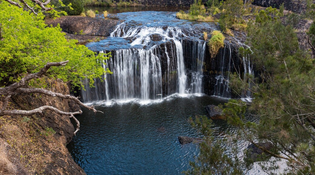 Millstream Falls National Park which includes a river or creek and a waterfall