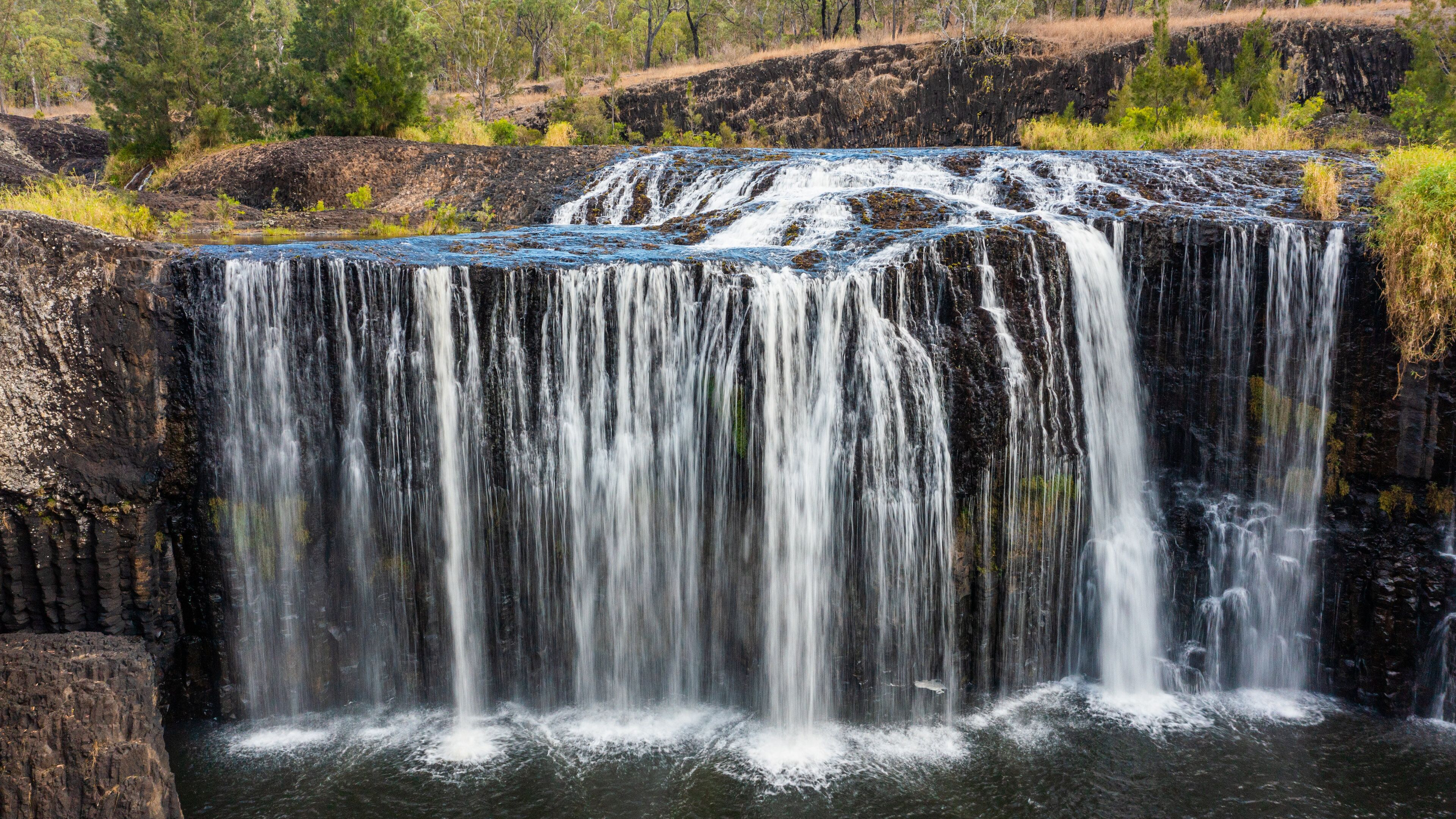 Millstream Falls National Park which includes a river or creek and a cascade