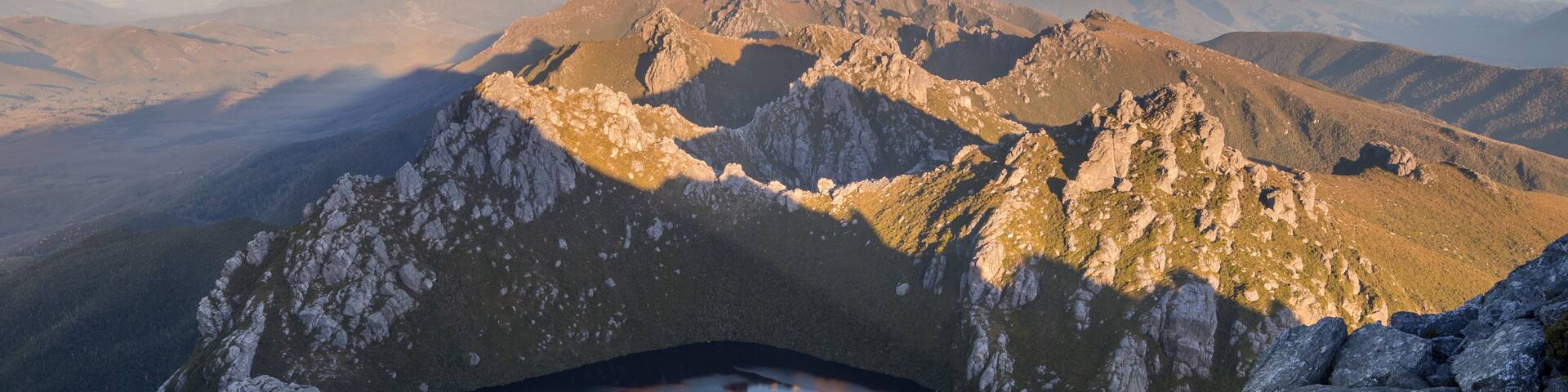 Sunset over Lake Oberon and the Western Arthur Range from Mount Sirius. Federation Peak in Distance. Southwest National Park, Tasmania. World Heritage Area