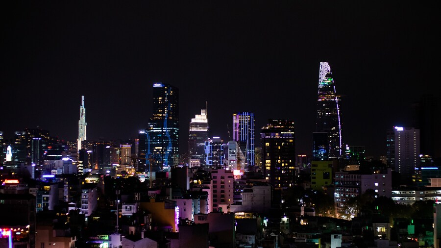 Ho Chi Minh city skyline at night. Skyscrapers, apartment buildings. Saigon Skydeck