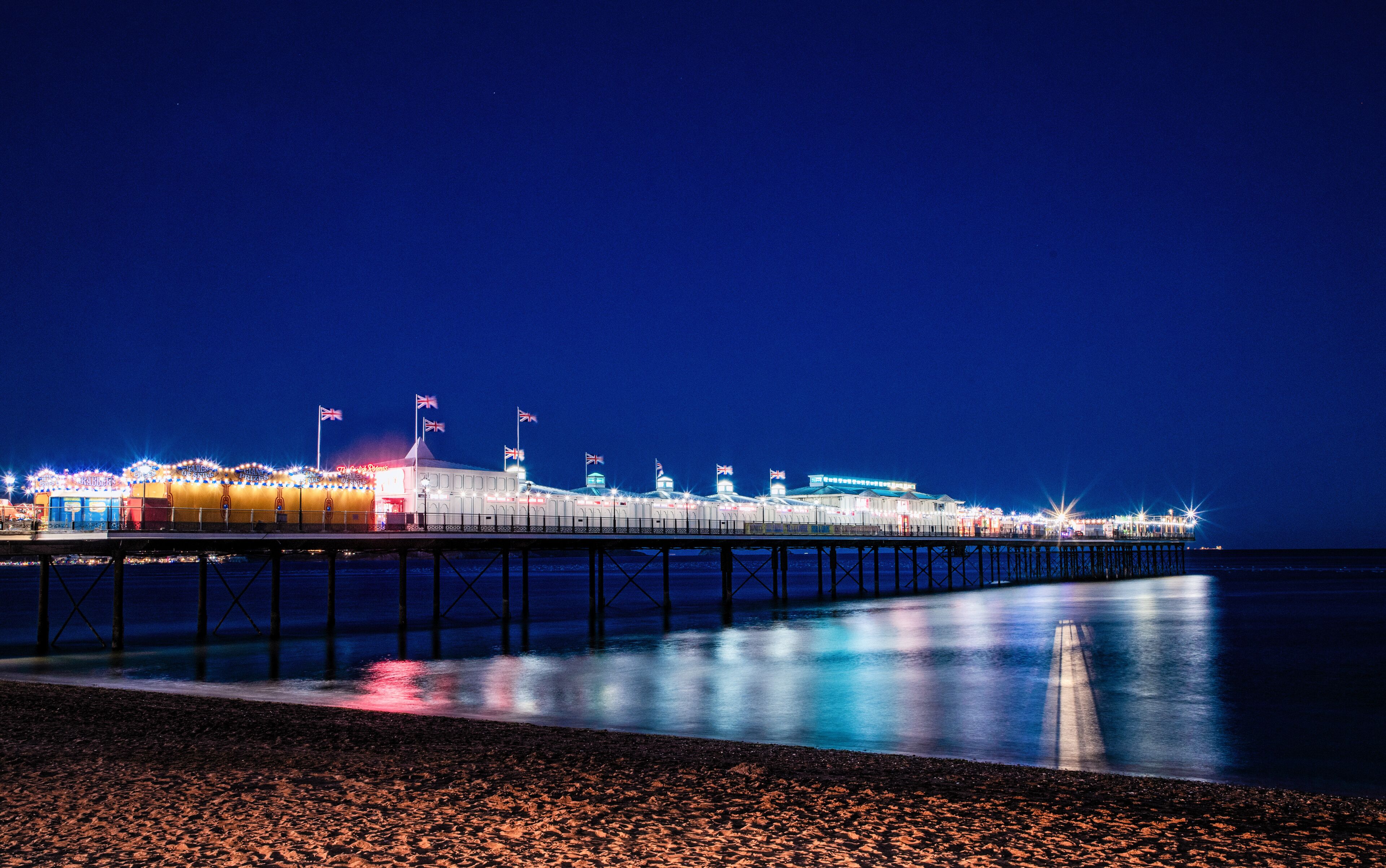 Paignton Pier Illuminated At Night