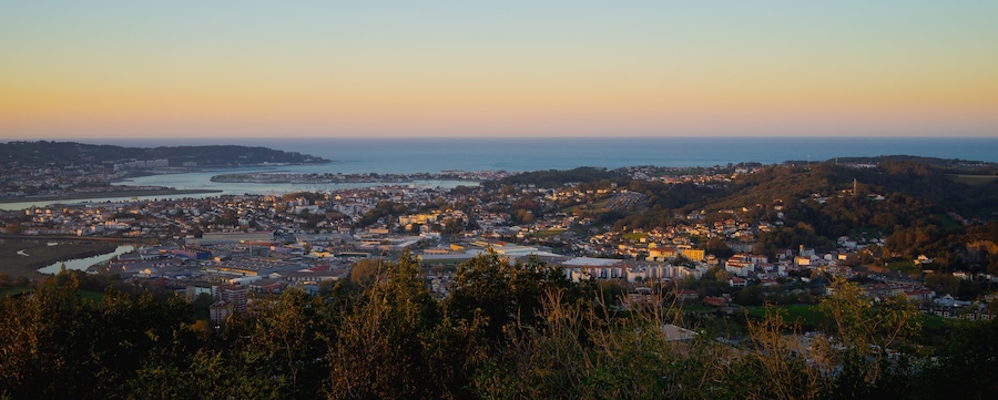 Panoramic view during an autumn sunset of the city of Irun, in Gipuzkoa, Basque Country, Spain