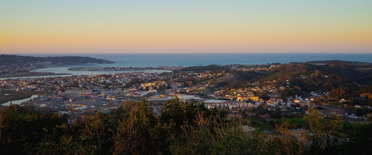 Panoramic view during an autumn sunset of the city of Irun, in Gipuzkoa, Basque Country, Spain