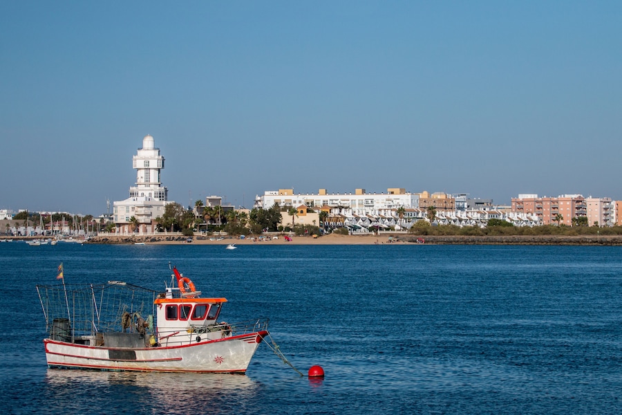 Summer view of the calm waters with sail boat and blue sky near Isla Cristina, Spain., Shutterstock ID 365623673, SF SSA Case with Manager Approval: Case 07151371, Job: Prepay credit, Client/Licensee: