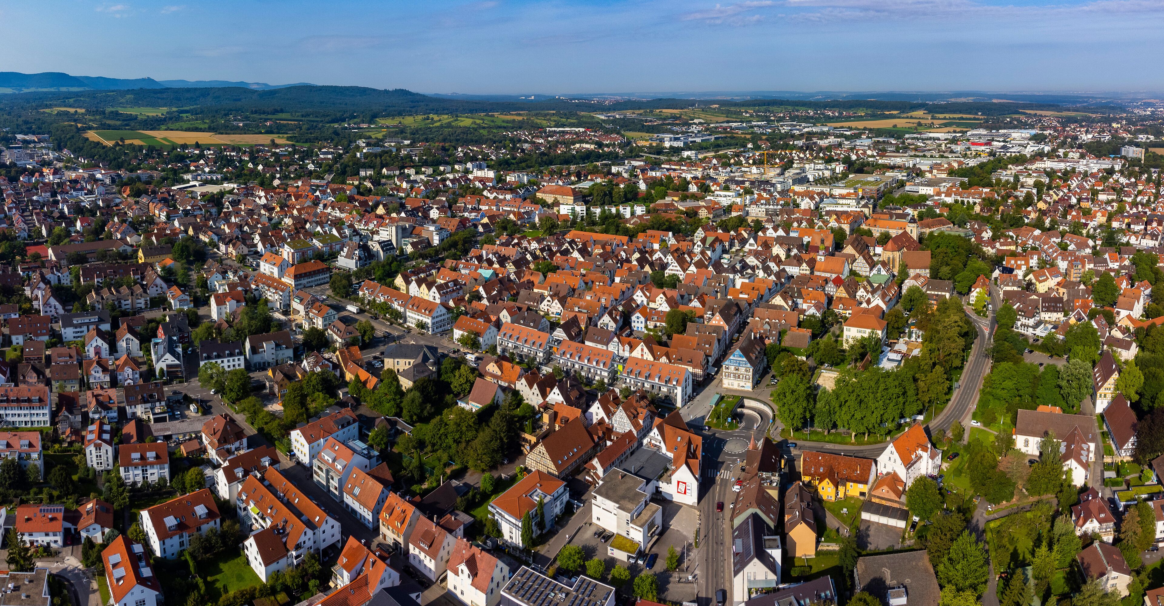 Aerial of the old town of the city Kirchheim unter Teck on a sunny noon in summer in Germany.