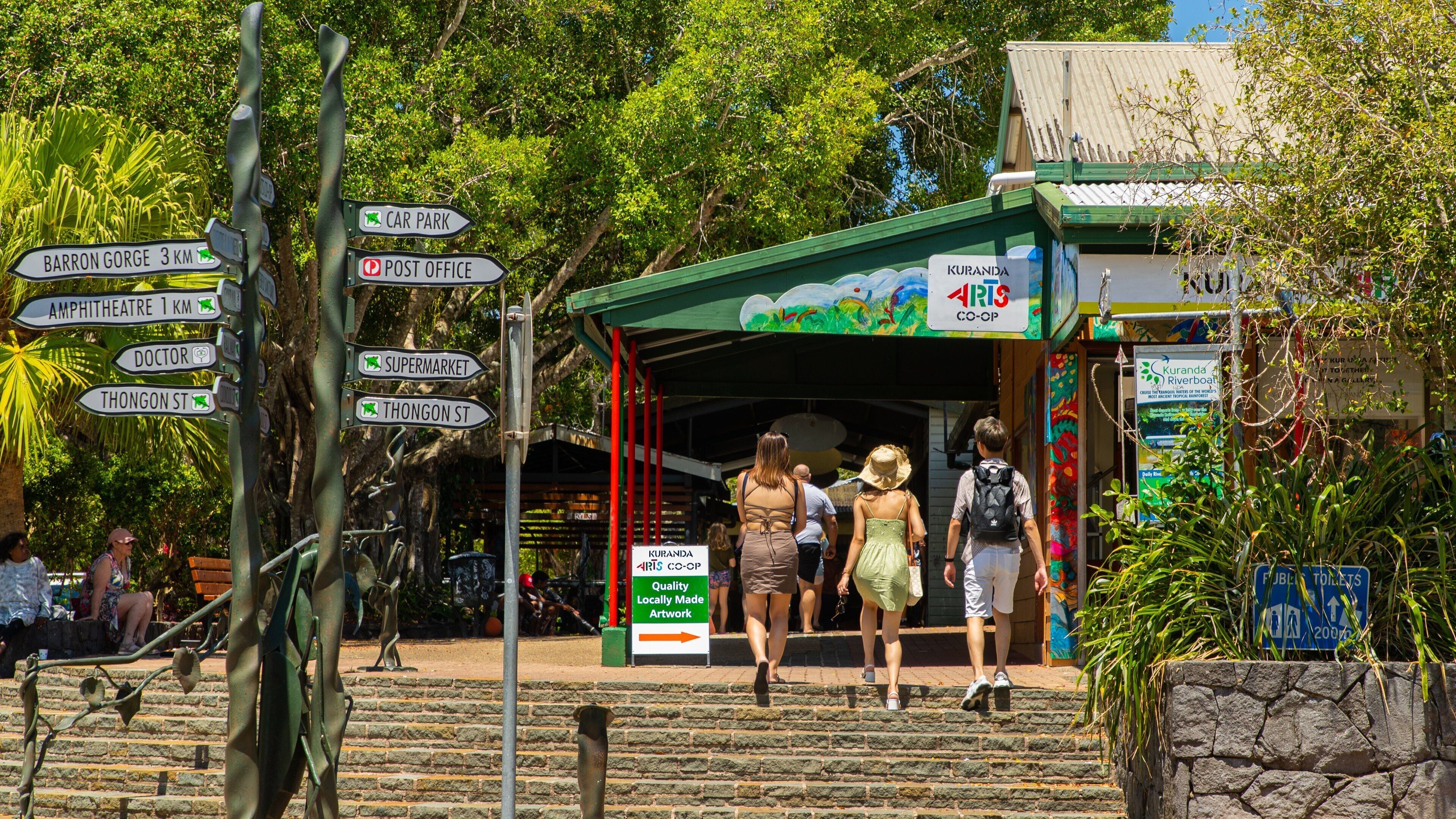 Kuranda featuring street scenes as well as a small group of people