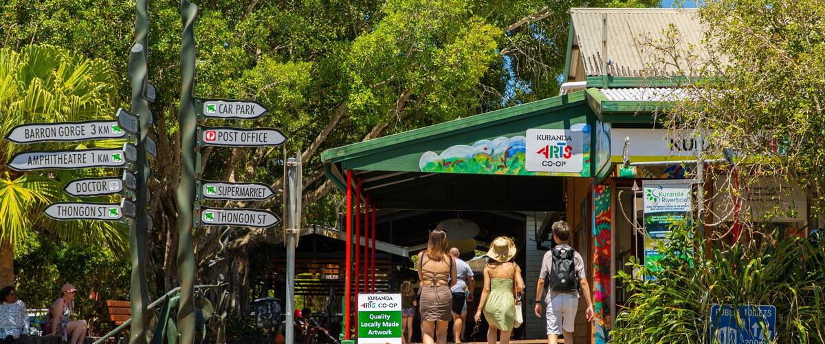 Kuranda featuring street scenes as well as a small group of people