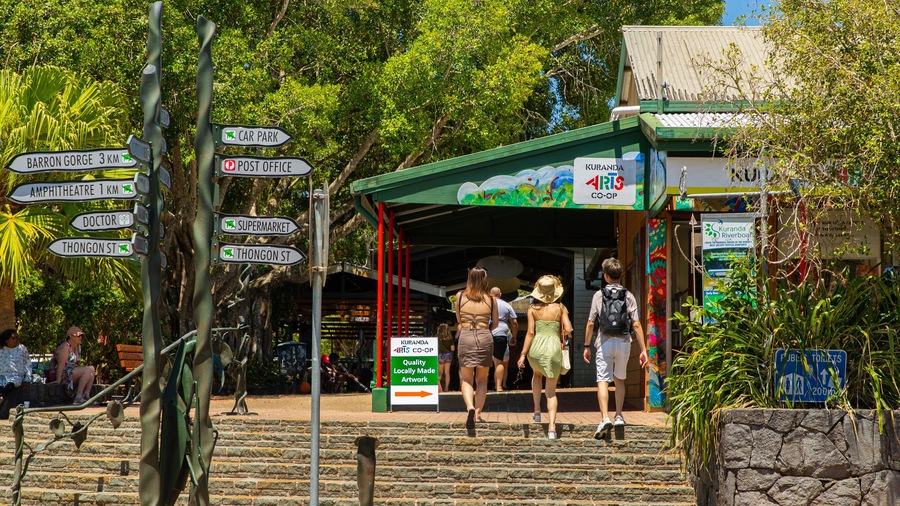 Kuranda featuring street scenes as well as a small group of people