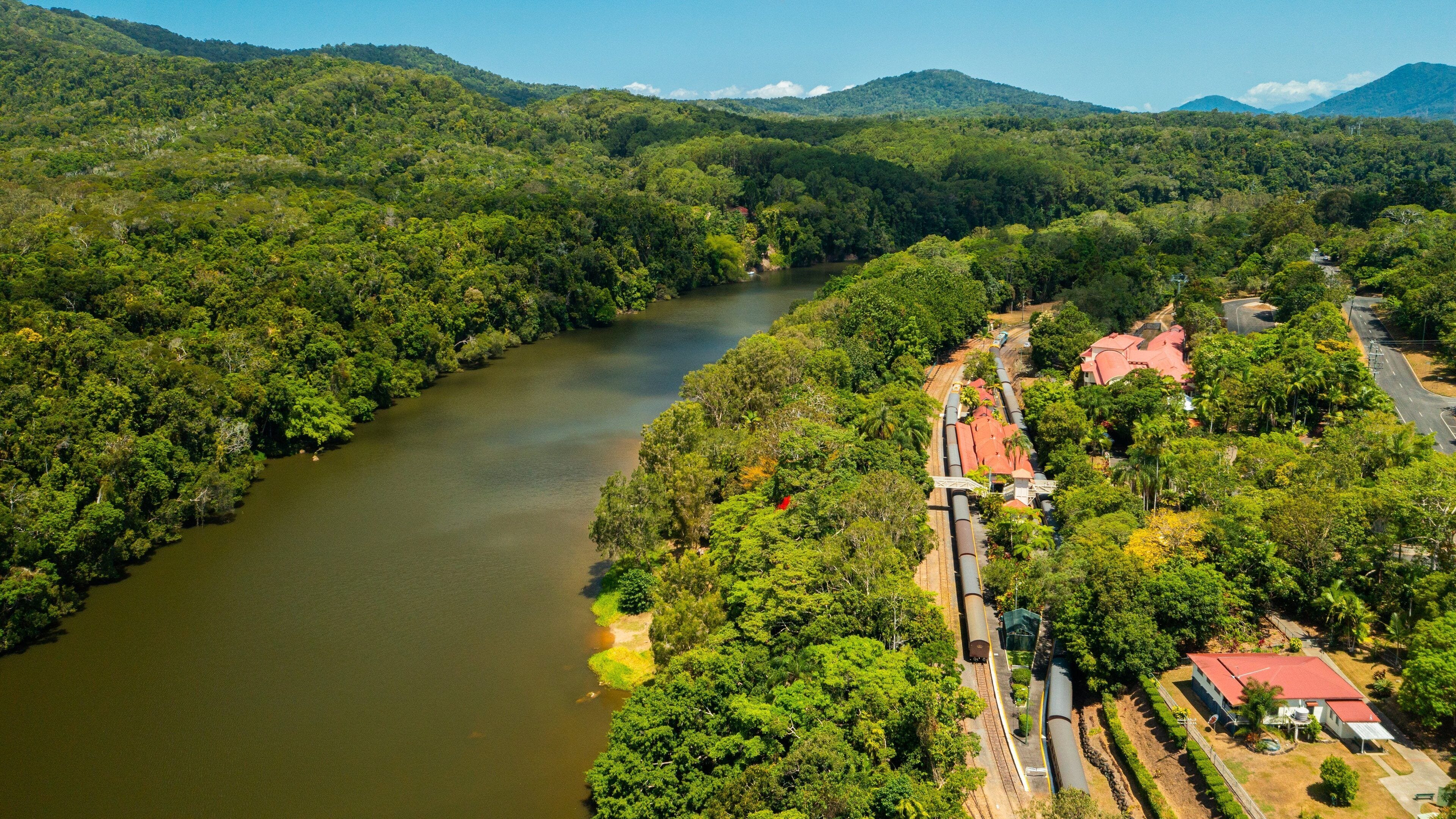 Kuranda which includes tranquil scenes, a river or creek and landscape views