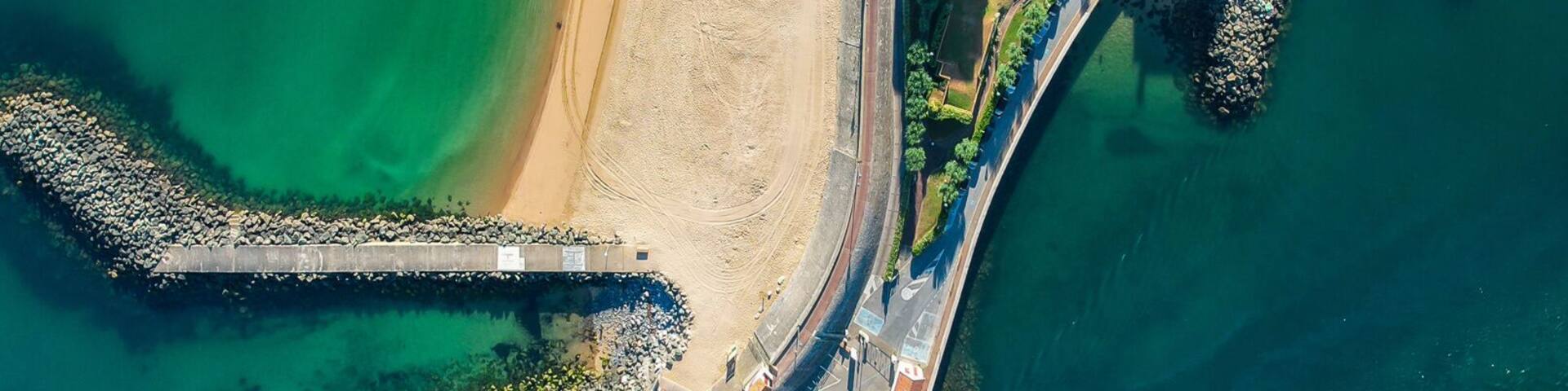 Aerial fly over above the french village of Saint-Jean-de-Luz during summer