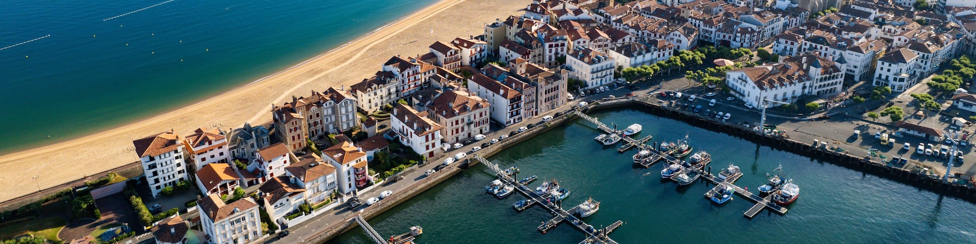 Aerial fly over above the french village of Saint-Jean-de-Luz during summer