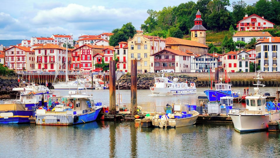 A harbor with colorful buildings and boats.