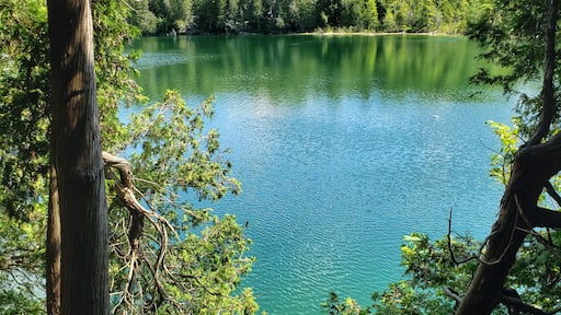 Land owned by the Crawford family in the 1800s, built a lumber mill at the end of the lake and later used as a summer retreat. Years later, sold to Conservation Halton for preservation of the beautiful lake!