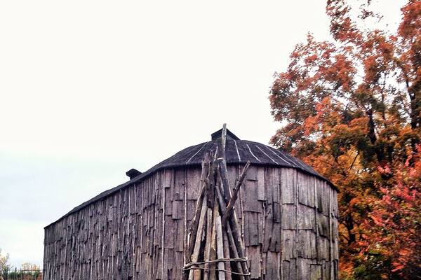 After Rattlesnake point we took a drive over to 2 other sister parks. This one was called Crawford Lake Conservation Area. We didn't have time to do the trails because they close at 7pm but we were able to check out the ancient establishments inside.
Unfortunately no one was around to explain what we were looking at so my knowledge of this is limited to what the signs said.
What you see here is called the Turtle Clan Log House and about 30 people lived inside of it.
Inside you would find 3 fire pits where the families would sleep around to stay warm in adjacent bunks.
They believe this area was inhabited by ancestors of the Wendat (Huron) or Attawandaron (Neutral) confederacies.