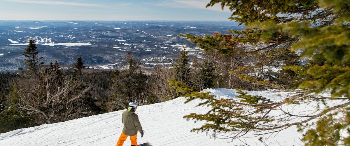 Ski Mont-Tremblant which includes landscape views, snow and snow boarding