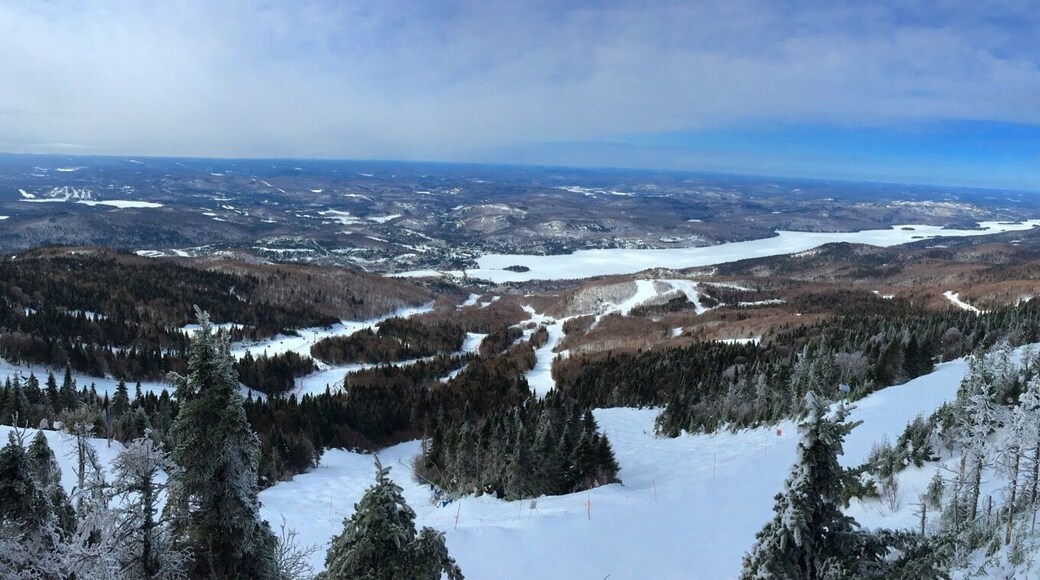 Spring skiing at Mt. Tremblant
Mont-Tremblant is a city in the Laurentian mountains of Quebec, Canada, approximately 130 kilometres (81 mi) north-west of Montreal and 140 kilometres (87 mi) north-east of Ottawa. The current municipality with city status was formed in 2000. Mont-Tremblant is most famous for its ski resort, the Mont-Tremblant Ski Resort, which is 5 kilometres from the village proper, at the foot of a mountain called Mont Tremblant (derived from local Algonquins who referred to it as the "trembling mountain"